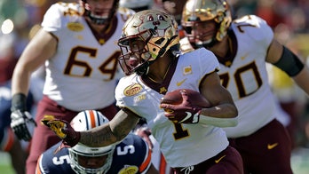 Johnson lifts No. 16 Minnesota over No. 9 Auburn in Outback