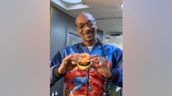Dunkin' teams up with Snoop Dogg to introduce glazed doughnut breakfast sandwich