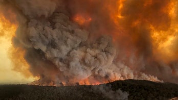 Australian prime minister berated by locals in visit to wildfire-ravaged town; fire conditions may worsen