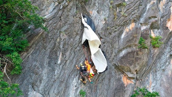BASE jumper rescued from Thai cliff after parachute gets caught, left dangling for hours
