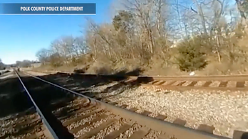 Georgia officer's body cam records train striking him as he chased suspect: 'Lucky to be alive'