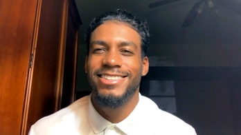 US coronavirus evacuee says passengers being cautious on military base: ‘I’m still wearing my mask’