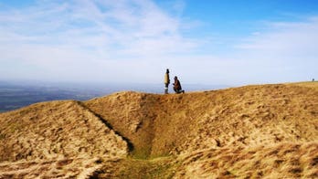 Woman who photographed romantic proposal finds mystery couple after putting Internet on the case