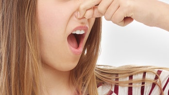 Airline passenger filmed drying wet shoe with overhead vent: 'If I catch someone doing this I’m punching'