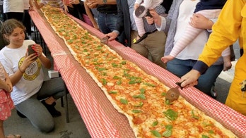 Italian restaurant makes 330-foot pizza to raise money for Australia firefighters