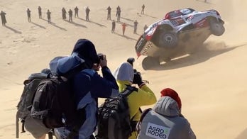 F1 champion Fernando Alonso rolls truck, keeps going during Dakar Rally