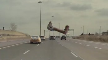 Hammer slams into Tesla Model 3 windshield in scary dashcam video