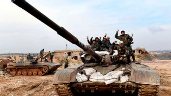 Syrian forces, with Russia's help, capture strategic town from rebels