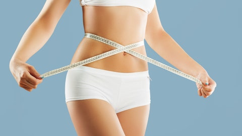 Woman celebrates 50-pound weight loss with pics at hotel where she felt her 'lowest,' goes viral