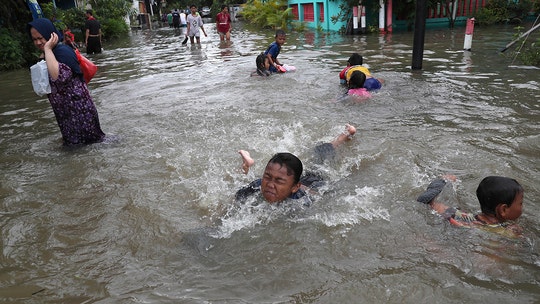 Indonesia floods triggered by torrential rain kill 17, displace thousands