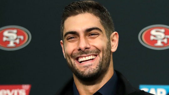 49ers' Jimmy Garoppolo takes hit in wallet for throwing ball into stands after Week 17 win