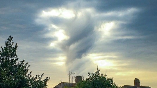 Woman captures cloud photo of 'Jesus with his arm outstretched'