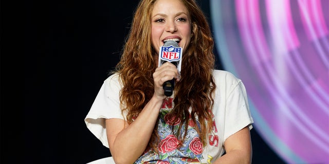 Shakira answers questions at a Super Bowl 54 press conference on Thursday.