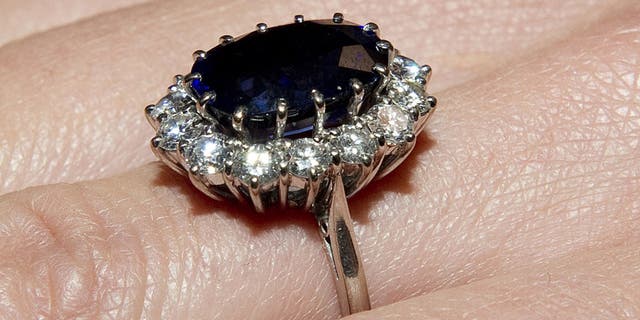 Kate Middleton shows her engagement ring given by Britain's Prince William in London Nov. 16, 2010.