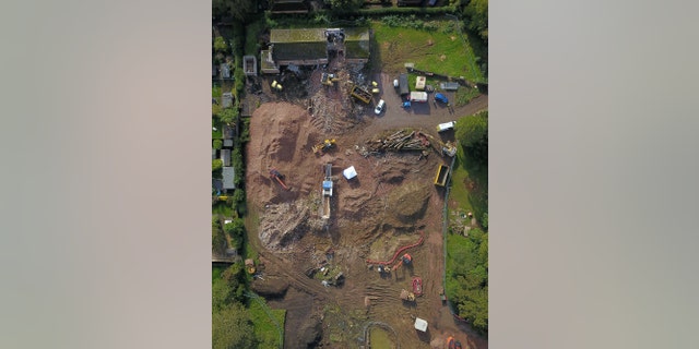 Aerial view of a police forensic tent erected on a building site off Scalford Road, Melton Mowbray. Police have launched an investigation after human bones were discovered on a building site in Melton Mowbray. (Credit: SWNS)