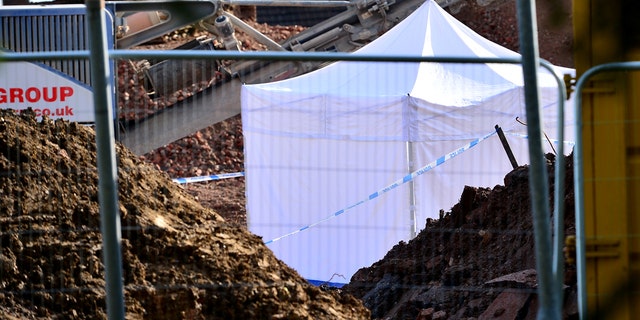 Officers have set up a forensic examination tent at the old Catherine Dalley House residential home, which is being demolished to make way for more than 50 retirement living apartments and bungalows. (Credit: SWNS)