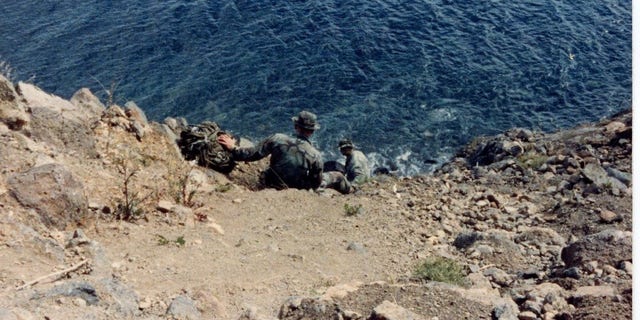 Hannel ascending a cliff during a military exercise in late 1987. (Eric Hannel)