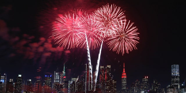WEEHAWKEN, NJ - JANUARY 23: Fireworks light up the sky over the skyline of midtown Manhattan and the Empire State Building in New York City celebrating the upcoming Chinese New Year on January 23, 2020 as seen from Weehawken, New Jersey. (Photo by Gary Hershorn/Getty Images)