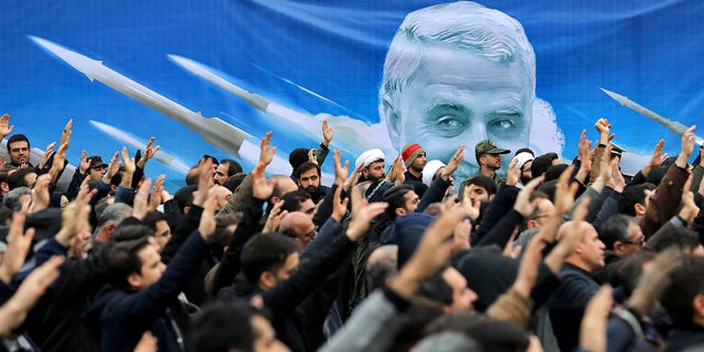 Protesters demonstrate over the U.S. airstrike in Iraq that killed Iranian Revolutionary Guard Gen. Qassem Soleimani in Tehran, Iran, Saturday Jan. 4, 2020. (Associated Press)