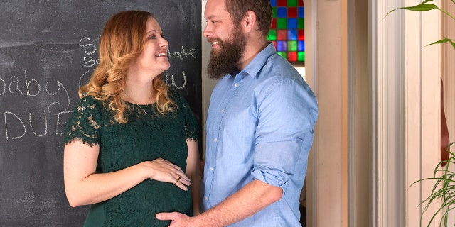 Jennifer Gobrecht, pictured with her husband, was born without a uterus and found out at age 17 that she would never be able to carry a child.