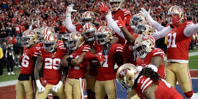 The San Francisco 49ers celebrates after interception by defensive back Emmanuel Moseley (41) during the first half of the NFL NFC Championship football game against the Green Bay Packers Sunday, Jan. 19, 2020, in Santa Clara, Calif. (AP Photo/Marcio Jose Sanchez)