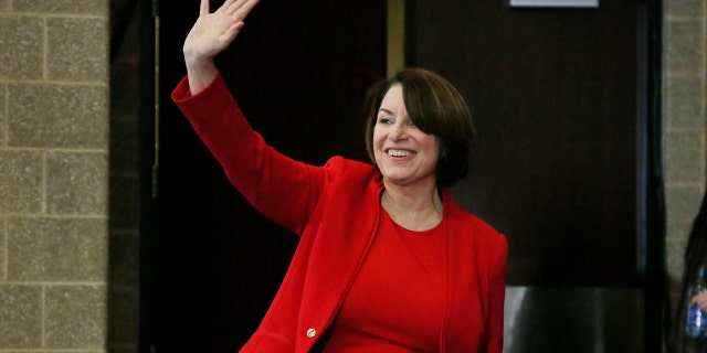 Democratic presidential candidate Amy Klobuchar, D-Minn., waves as she arrives to speak to the Scott County Iowa Democrats Saturday, Jan. 25, 2020, in Bettendorf, Iowa. (AP Photo/Sue Ogrocki)