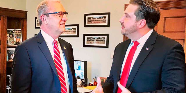 FILE - In this Jan. 30, 2019 photo, Tommy Fisher, right, talks with Sen. Kevin Cramer, R-N.D., at the lawmaker's office in Washington, D.C. (Sen. Kevin Cramer's office via AP, File)
