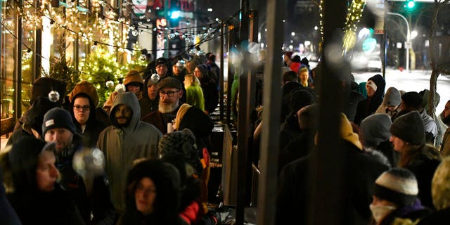 People began lining up on Wednesday at 6 a.m., the earliest that Illinois' new law allowed such sales. (AP Photo/Paul Beaty)