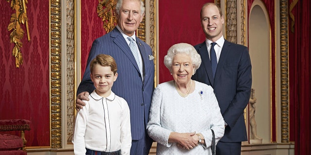 In this handout photo provided by Buckingham Palace and taken Wednesday, Dec. 18, 2019, Britain's Queen Elizabeth, Prince Charles, Prince William and Prince George pose for a photo to mark the start of the new decade in the Throne Room of Buckingham Palace, London. This is only the second time such a portrait of the monarch and the next three in line to the throne has been released, the first was in April 2016 to celebrate Her Majesty's 90th birthday.