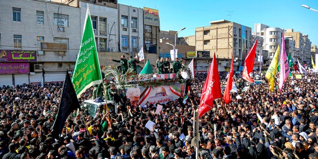 The body of Gen. Qassem Soleimani arrived Sunday in Iran to throngs of mourners, as President Trump threatened to bomb 52 sites in the Islamic Republic if Tehran retaliates by attacking Americans.