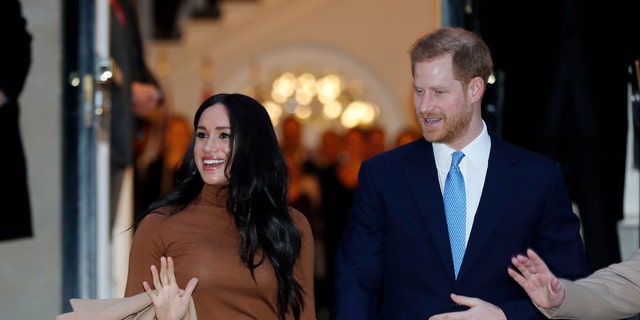 Britain's Prince Harry and Meghan, Duchess of Sussex leave after visiting Canada House in London, Tuesday Jan. 7, 2020, after their recent stay in Canada. (AP Photo/Frank Augstein)