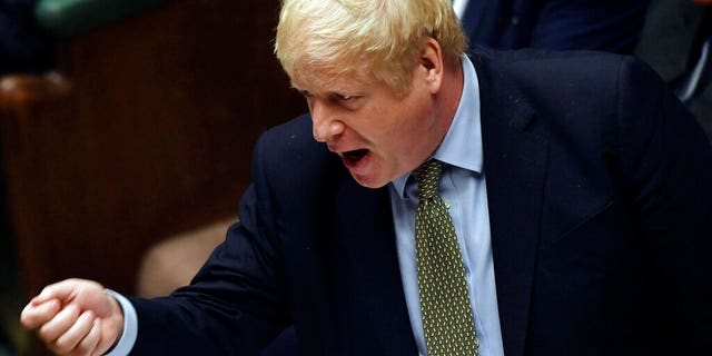Britain's Prime Minister Boris Johnson gestures during the first Prime Minister's Questions of the year, in the House of Commons in London.