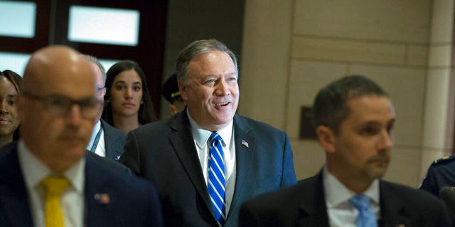 Secretary of State Mike Pompeo arrives to conduct a briefing on last week's targeted killing of Iran's senior military commander Gen. Qassem Soleimani on Capitol Hill, in Washington, Wednesday, Jan. 8, 2020. (AP Photo/Jose Luis Magana)