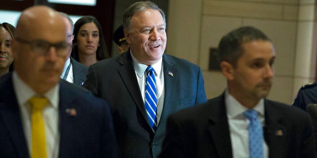 Secretary of State Mike Pompeo arrives to conduct a briefing on last week's targeted killing of Iran's senior military commander Gen. Qassem Soleimani on Capitol Hill, in Washington, Wednesday, Jan. 8, 2020. (AP Photo/Jose Luis Magana)