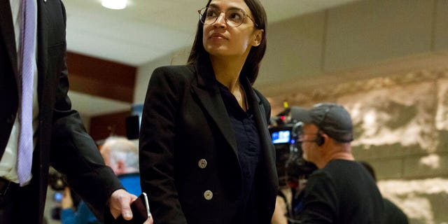 Rep. Alexandria Ocasio-Cortez, D-N.Y., arrives for a briefing on last week's targeted killing of Iran's senior military commander Gen. Qassem Soleimani on Capitol Hill, in Washington, Wednesday, Jan. 8, 2020. (AP Photo/Jose Luis Magana)