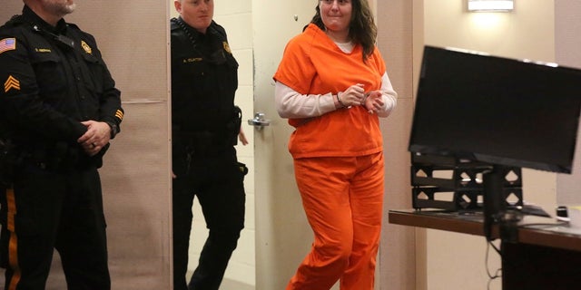 Heather Barbera enters court for her sentencing for the July 2018 slaying of her mother and grandmother in their Ventnor condo, in Atlantic County Superior Court, in Mays Landing. (Vernon Ogrodnek/The Philadelphia Inquirer via AP, Pool)