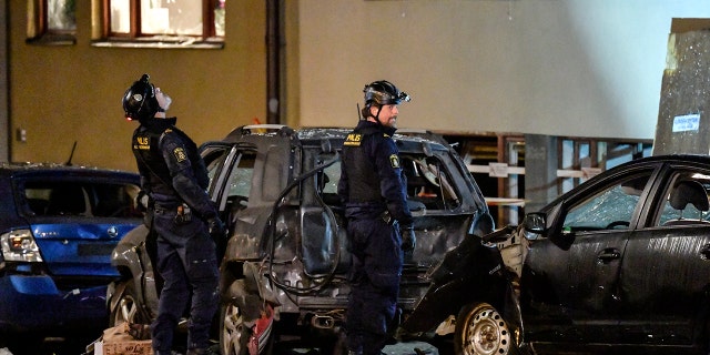 Police work at the scene of an explosion that caused damage to a residential building in central Stockholm, early Monday, Jan. 13, 2020. There were no reported injuries. (Anders Wiklund/TT News Agency via AP)