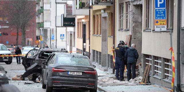 Police work at the scene of an explosion which caused damage to a residential building in central Stockholm, Monday, Jan. 13, 2020. There were no reported injuries. (Janerik Henriksson /TT News Agency via AP)