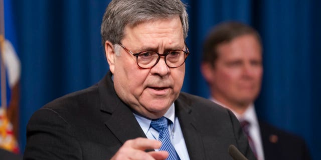 Attorney General William Barr speaks to reporters at the Justice Department in Washington, Monday, Jan. 13, 2020.
