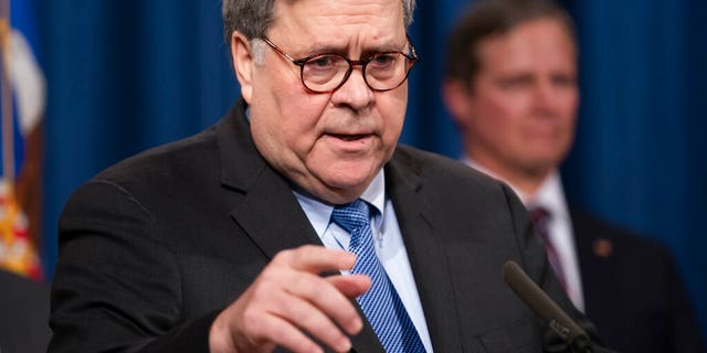 Attorney General William Barr speaks to reporters at the Justice Department in Washington, Monday, Jan. 13, 2020.