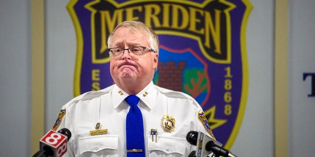 Meriden, Conn., Police chief Jeffry Cossette announces that the identity of the mother of an abandoned infant found dead in 1988 has been established, during a Tuesday news conference. (Mark Mirko/Hartford Courant via AP)