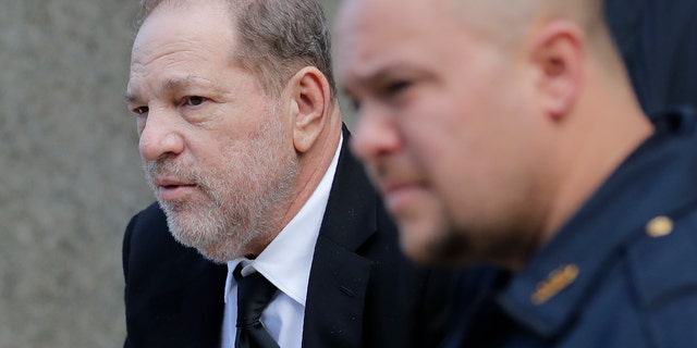 Harvey Weinstein leaves a Manhattan courthouse during a break in jury selection for his rape trial in New York, Thursday, Jan. 16, 2020.