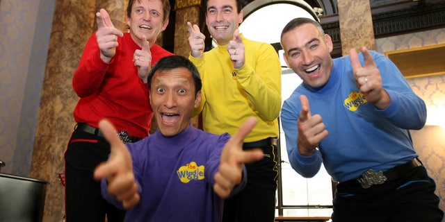 In this June 28, 2006 file photo, Australian children's entertainers The Wiggles, Murray Cook (Red Wiggle), Greg Page (Yellow Wiggle), Jeff Fatt (Purple Wiggle), and Anthony Field (Blue Wiggle) make a special appearance at the Australian High Commission in London at the start of their UK tour.