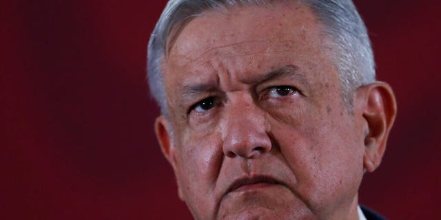 FILE: Mexican President Andres Manuel Lopez Obrador listens to questions during his daily morning press conference at the National Palace in Mexico City.
