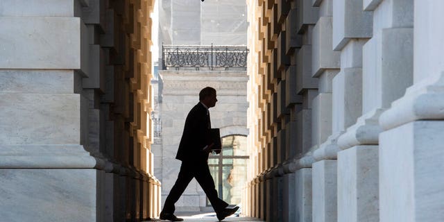 Supreme Court Chief Justice John Roberts arrives at the Capitol in Washington, Tuesday, Jan. 21, 2020. President Donald Trump’s impeachment trial quickly burst into a partisan fight Tuesday as proceedings began unfolding at the Capitol. Democrats objected strongly to rules proposed by the Republican leader for compressed arguments and a speedy trial. (AP Photo/Cliff Owen)