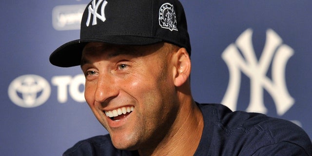 New York Yankees' Derek Jeter smiles as he speaks about his 3,000th career hit at a press conference after a baseball game against the Tampa Bay Rays, at Yankee Stadium in New York.