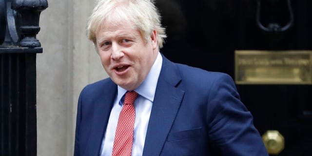 Britain's Prime Minister Boris Johnson leaves 10 Downing Street to attend the weekly session of Prime Ministers Questions in Parliament in London.