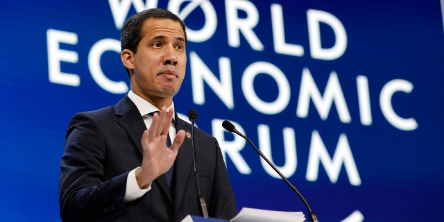 The leader of Venezuela's political opposition Juan Guaido addresses the World Economic Forum in Davos, Switzerland, Thursday, Jan. 23, 2020. The 50th annual meeting of the forum is taking place in Davos from Jan. 21 until Jan. 24, 2020. (AP Photo/Markus Schreiber)