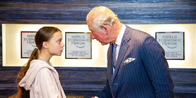 In this photo made available by World Economic Forum, Britain's Prince Charles meets climate activist Greta Thunberg after he delivered a speech at the World Economic Forum in Davos, Switzerland, Wednesday, Jan. 22.