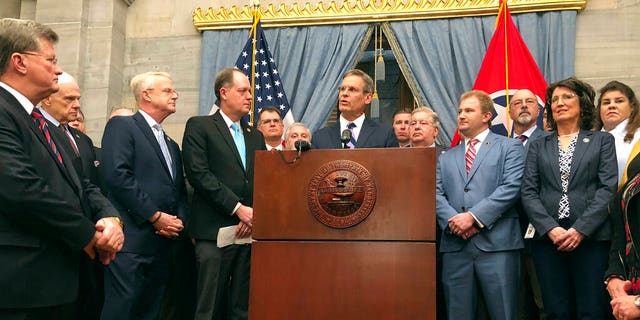 Tennessee Gov. Bill Lee, center, and fellow Republicans in the state General Assembly hold a news conference at the Tennessee Capitol on Thursday, Jan. 23, 2020, in Nashville,Tenn., to discuss a new anti-abortion proposal. (AP Photo/Jonathan Mattise)
